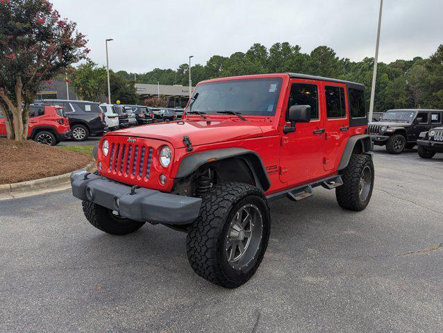 Photo of 2015 Firecracker Red Clear Coat Jeep Wrangler Unlimited