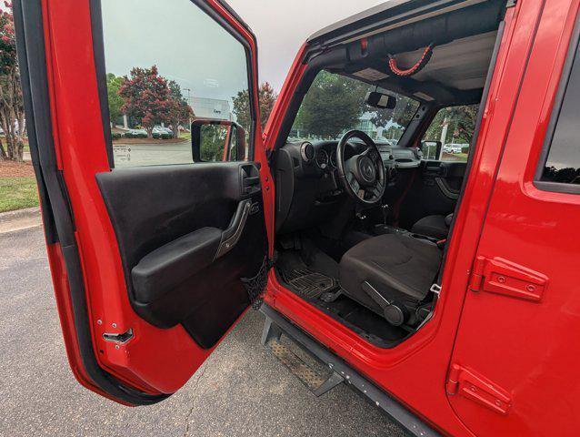 Photo of 2015 Firecracker Red Clear Coat Jeep Wrangler Unlimited