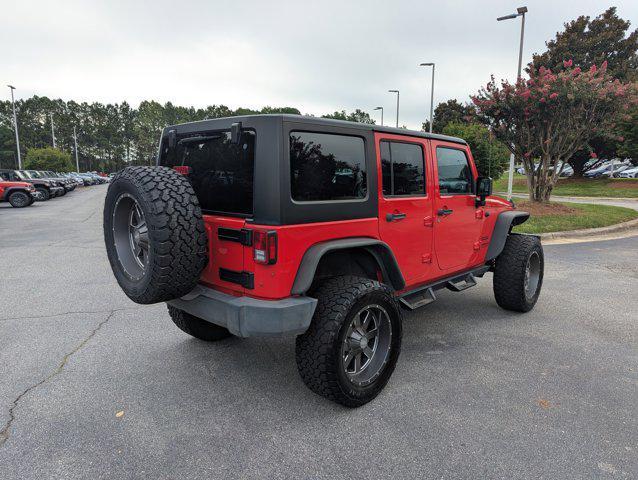 Photo of 2015 Firecracker Red Clear Coat Jeep Wrangler Unlimited