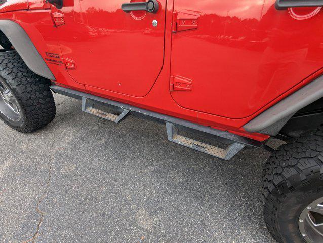 Photo of 2015 Firecracker Red Clear Coat Jeep Wrangler Unlimited
