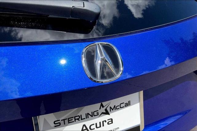 Photo of 2025 Apex Blue Pearl Acura MDX