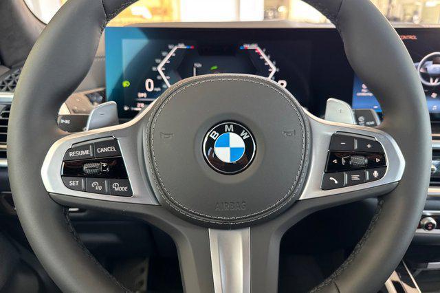 Photo of 2026 Black Sapphire Metallic BMW X7