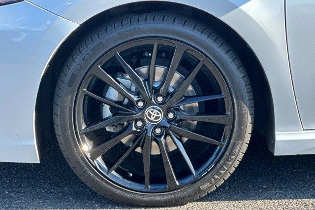 Photo of 2023 Wind Chill Pearl/Midnight Black Metallic Toyota Camry