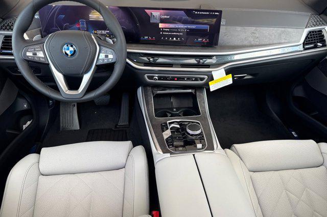 Photo of 2026 Skyscraper Grey Metallic BMW X5 PHEV