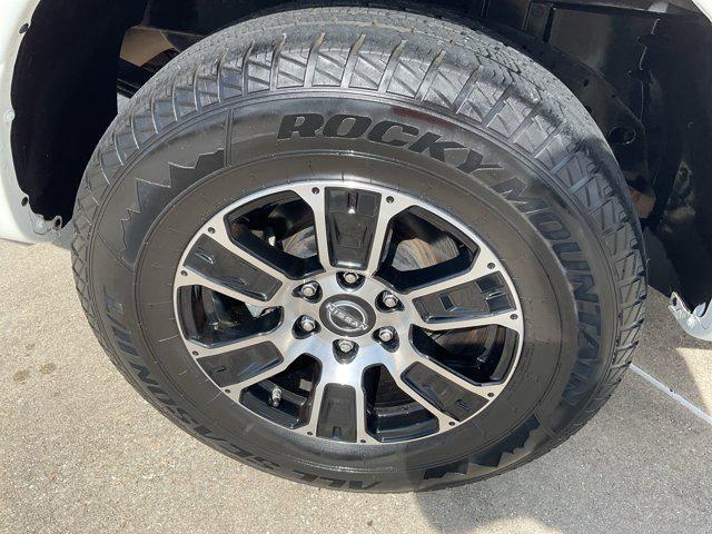 Photo of 2023 Glacier White Nissan Titan