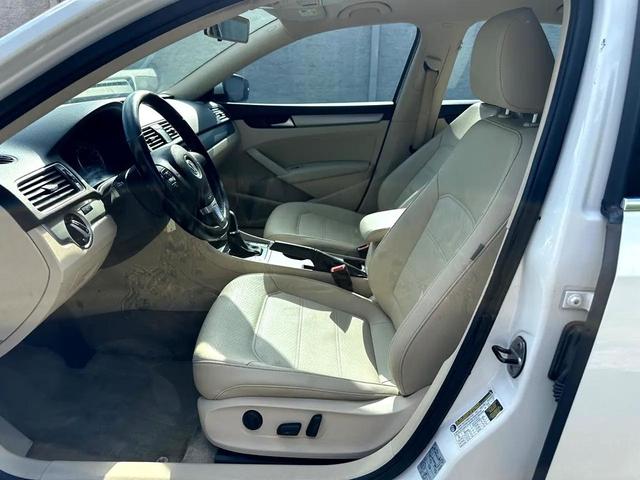 Photo of 2014 Candy White Volkswagen Passat
