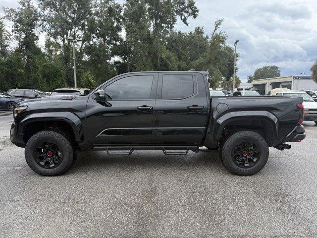 Photo of 2025 Black Toyota Tacoma Hybrid