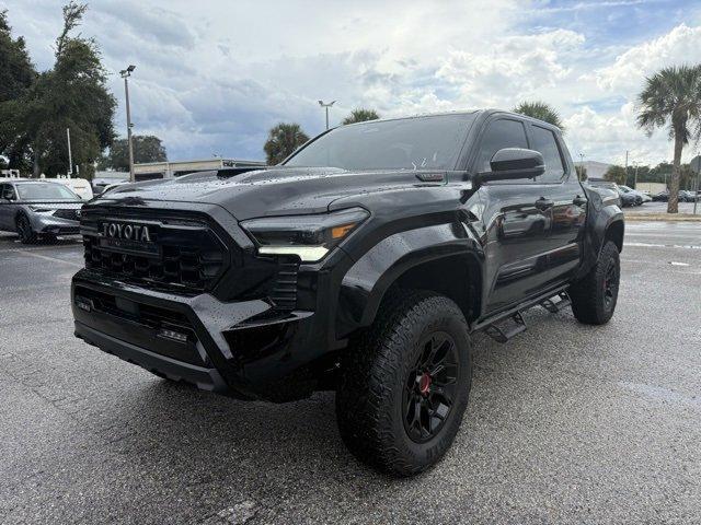 Photo of 2025 Black Toyota Tacoma Hybrid