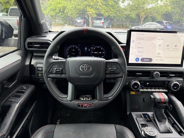 Photo of 2025 Black Toyota Tacoma Hybrid