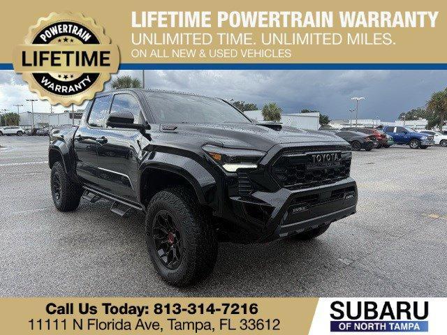 Photo of 2025 Black Toyota Tacoma Hybrid