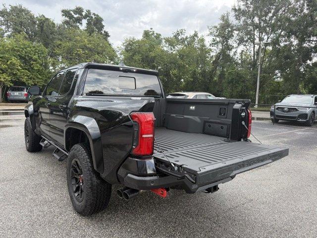 Photo of 2025 Black Toyota Tacoma Hybrid