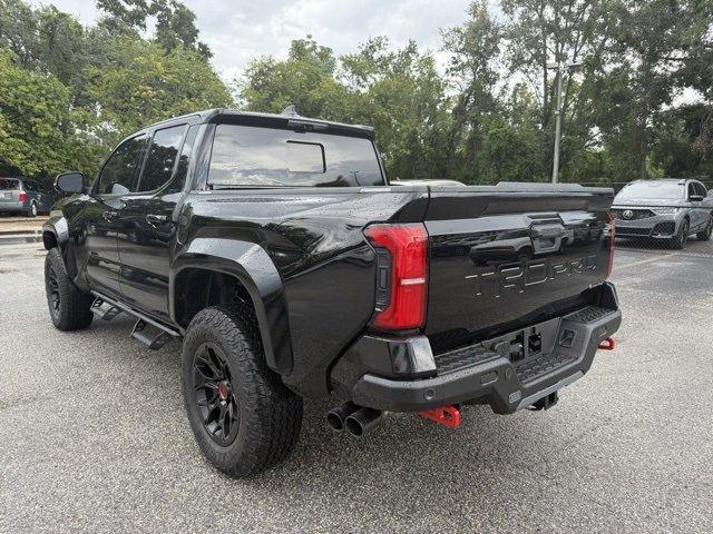 Photo of 2025 Black Toyota Tacoma Hybrid