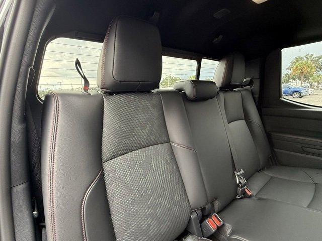 Photo of 2025 Black Toyota Tacoma Hybrid