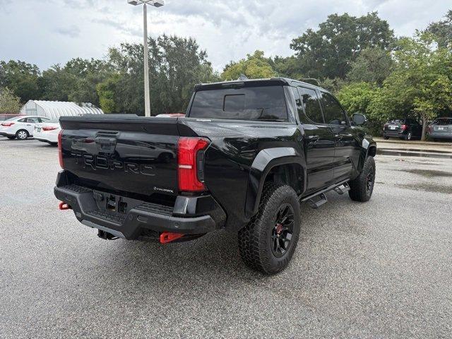 Photo of 2025 Black Toyota Tacoma Hybrid
