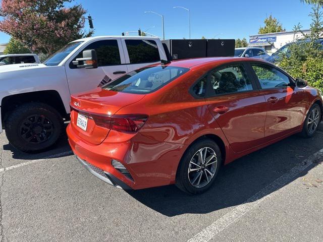 Photo of 2022 Fire Orange Kia Forte