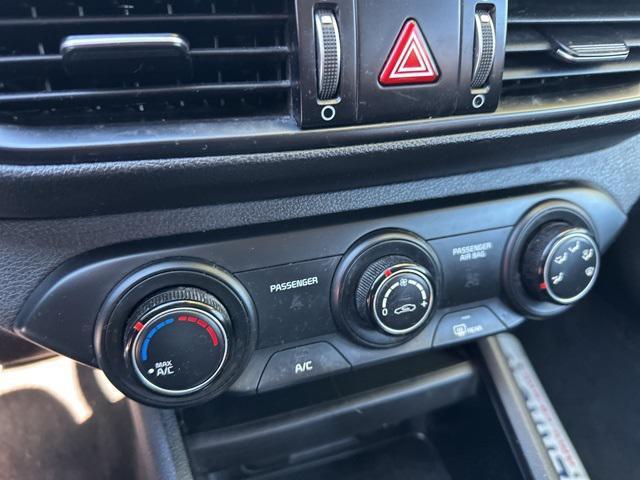 Photo of 2022 Fire Orange Kia Forte