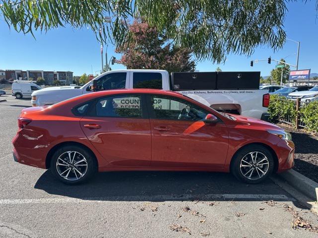 Photo of 2022 Fire Orange Kia Forte