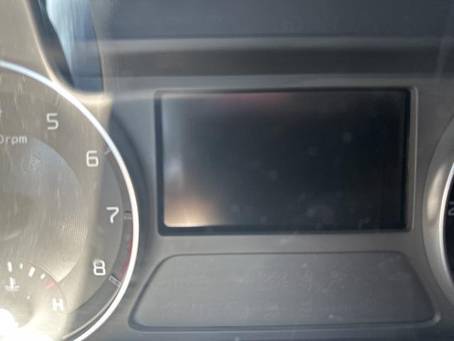 Photo of 2022 Fire Orange Kia Forte