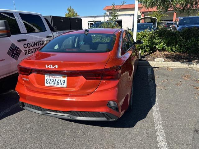 Photo of 2022 Fire Orange Kia Forte