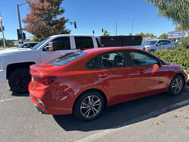 Photo of 2022 Fire Orange Kia Forte