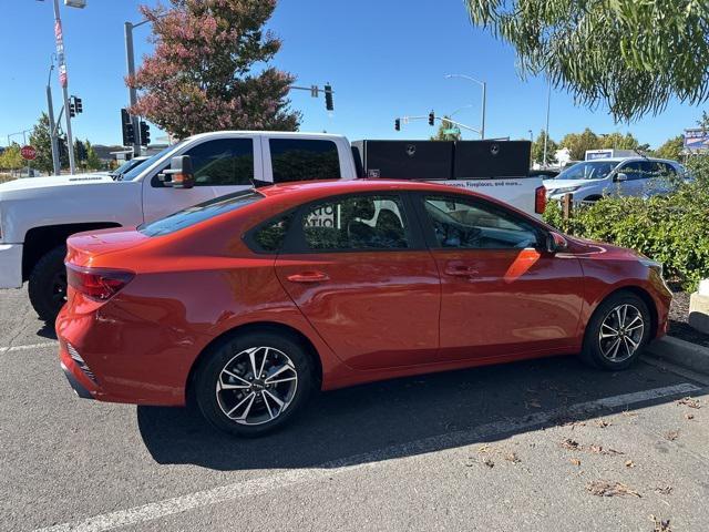 Photo of 2022 Fire Orange Kia Forte