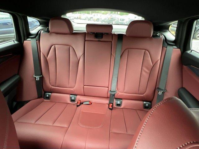 Photo of 2025 Aventurin Red Metallic BMW X4