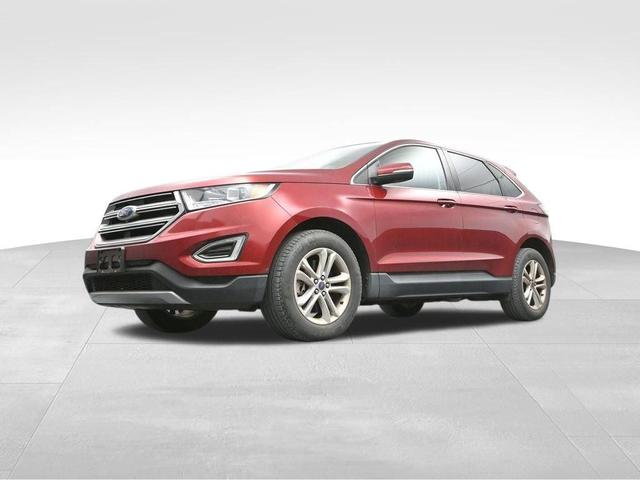 Photo of 2015 Ruby Red Metallic Tinted Clearcoat Ford Edge