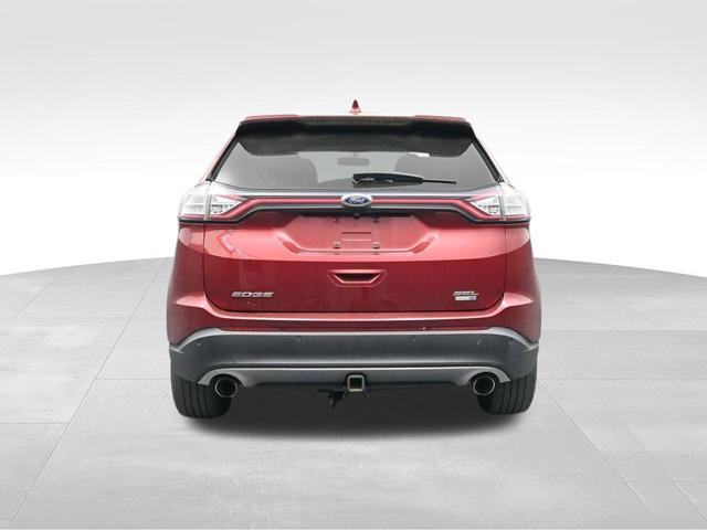 Photo of 2015 Ruby Red Metallic Tinted Clearcoat Ford Edge