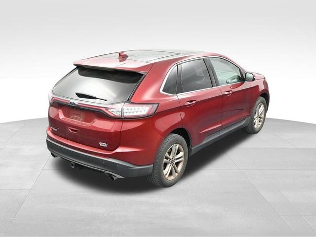 Photo of 2015 Ruby Red Metallic Tinted Clearcoat Ford Edge