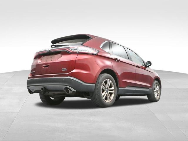 Photo of 2015 Ruby Red Metallic Tinted Clearcoat Ford Edge
