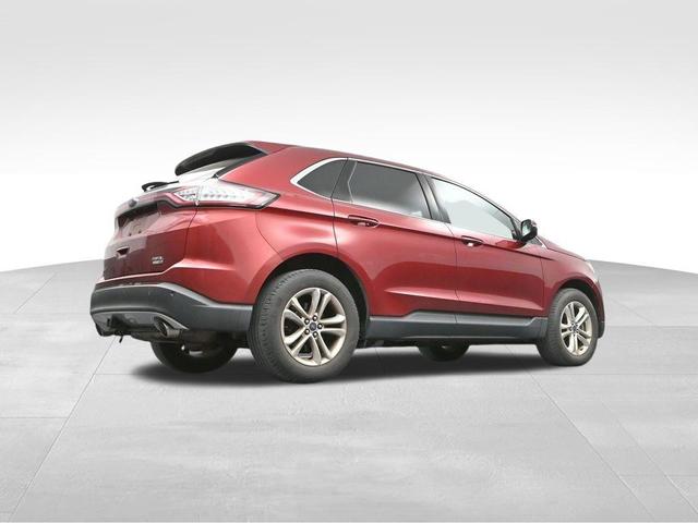 Photo of 2015 Ruby Red Metallic Tinted Clearcoat Ford Edge