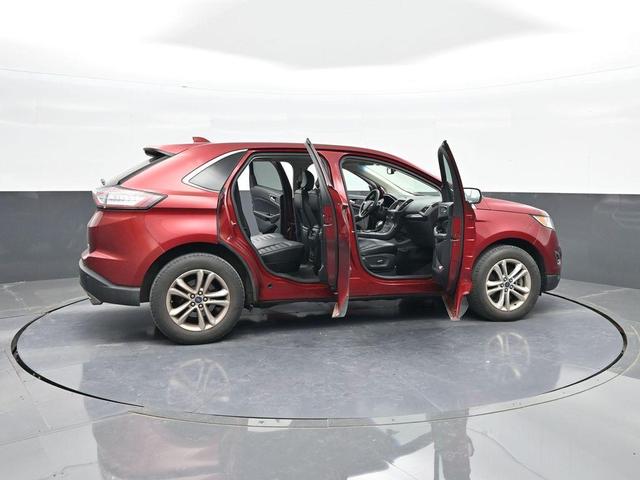 Photo of 2015 Ruby Red Metallic Tinted Clearcoat Ford Edge