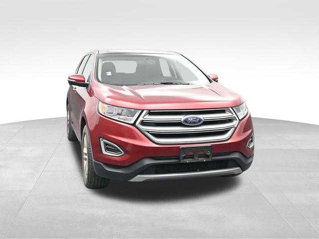 Photo of 2015 Ruby Red Metallic Tinted Clearcoat Ford Edge