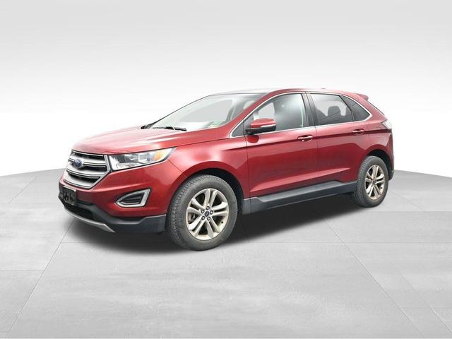 Photo of 2015 Ruby Red Metallic Tinted Clearcoat Ford Edge