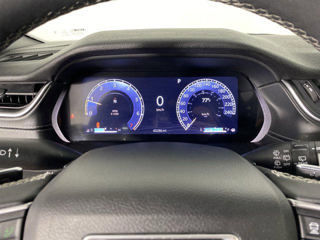Photo of 2024 Diamond Black Crystal Pearlcoat Jeep Grand Cherokee L