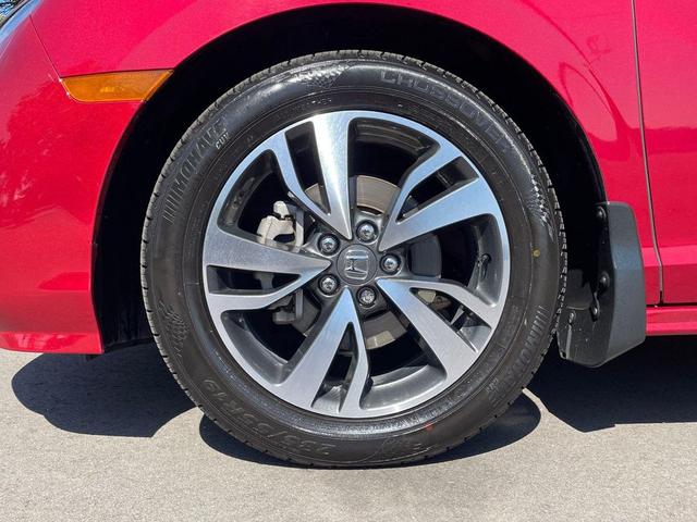 Photo of 2024 Radiant Red Metallic II Honda Odyssey
