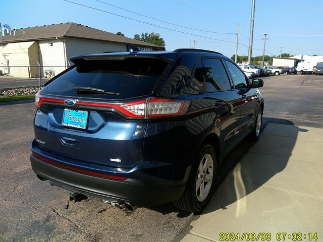 Photo of 2017 Blue Jeans Metallic Ford Edge