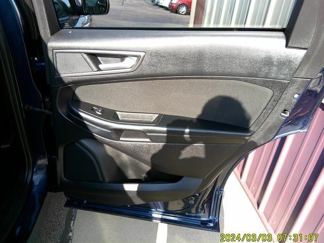 Photo of 2017 Blue Jeans Metallic Ford Edge