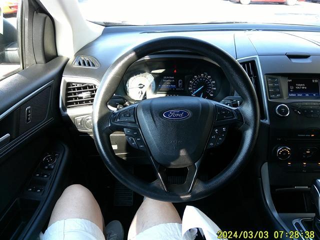 Photo of 2017 Blue Jeans Metallic Ford Edge