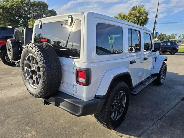 Photo of 2021 BRIGHT WHITE CL Jeep Wrangler Unlimited