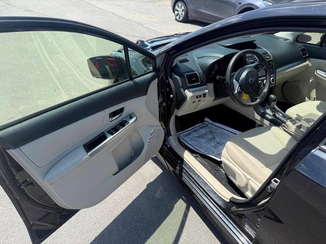 Photo of 2016 Crystal Black Silica Subaru Impreza