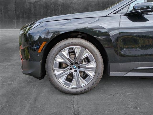 Photo of 2025 Black Sapphire Metallic BMW iX