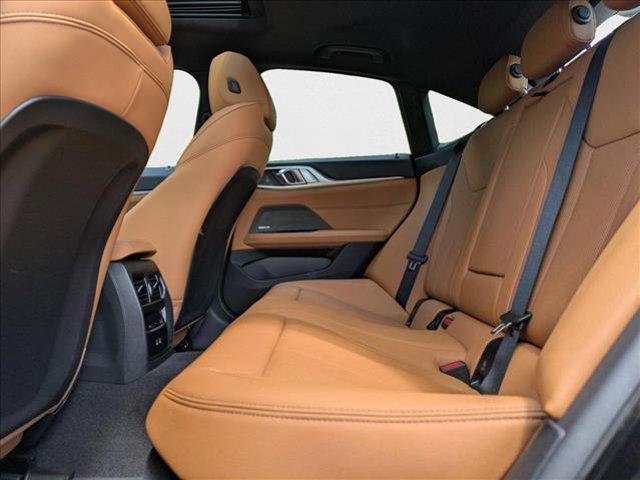 Photo of 2025 Black Sapphire Metallic BMW i4 Gran Coupe