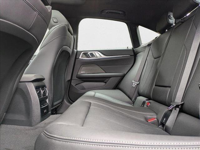 Photo of 2025 Black Sapphire Metallic BMW i4 Gran Coupe
