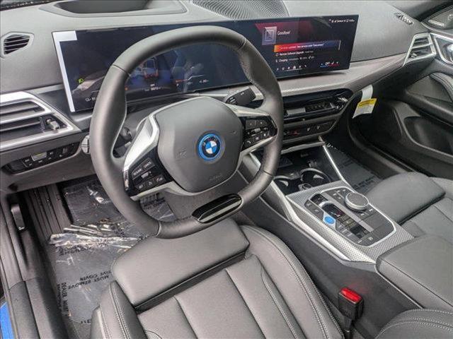 Photo of 2025 Black Sapphire Metallic BMW i4 Gran Coupe