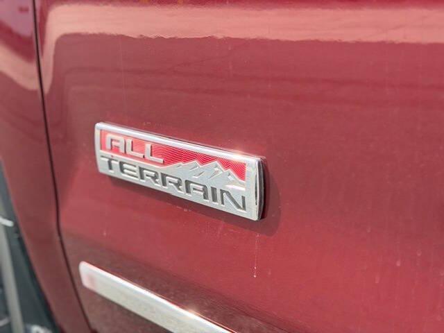 Photo of 2014 Dark Toreador Red GMC Sierra 1500