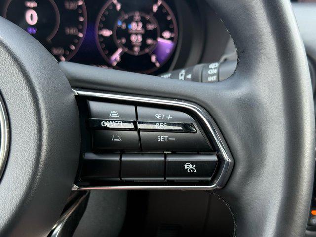 Photo of 2024 Deep Crystal Blue Mica Mazda CX-90 PHEV