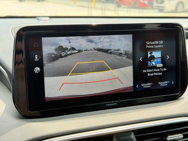 Photo of 2023 Calypso Red Hyundai SANTA FE
