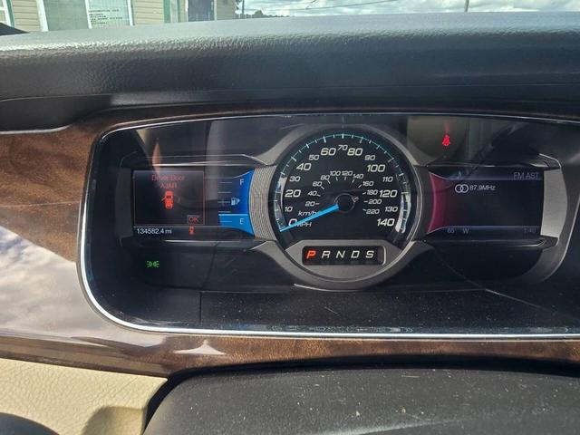 Photo of 2013 Deep Impact Blue Metallic Ford Taurus