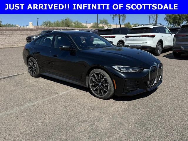 Photo of 2022 Black Sapphire Metallic BMW i4 Gran Coupe
